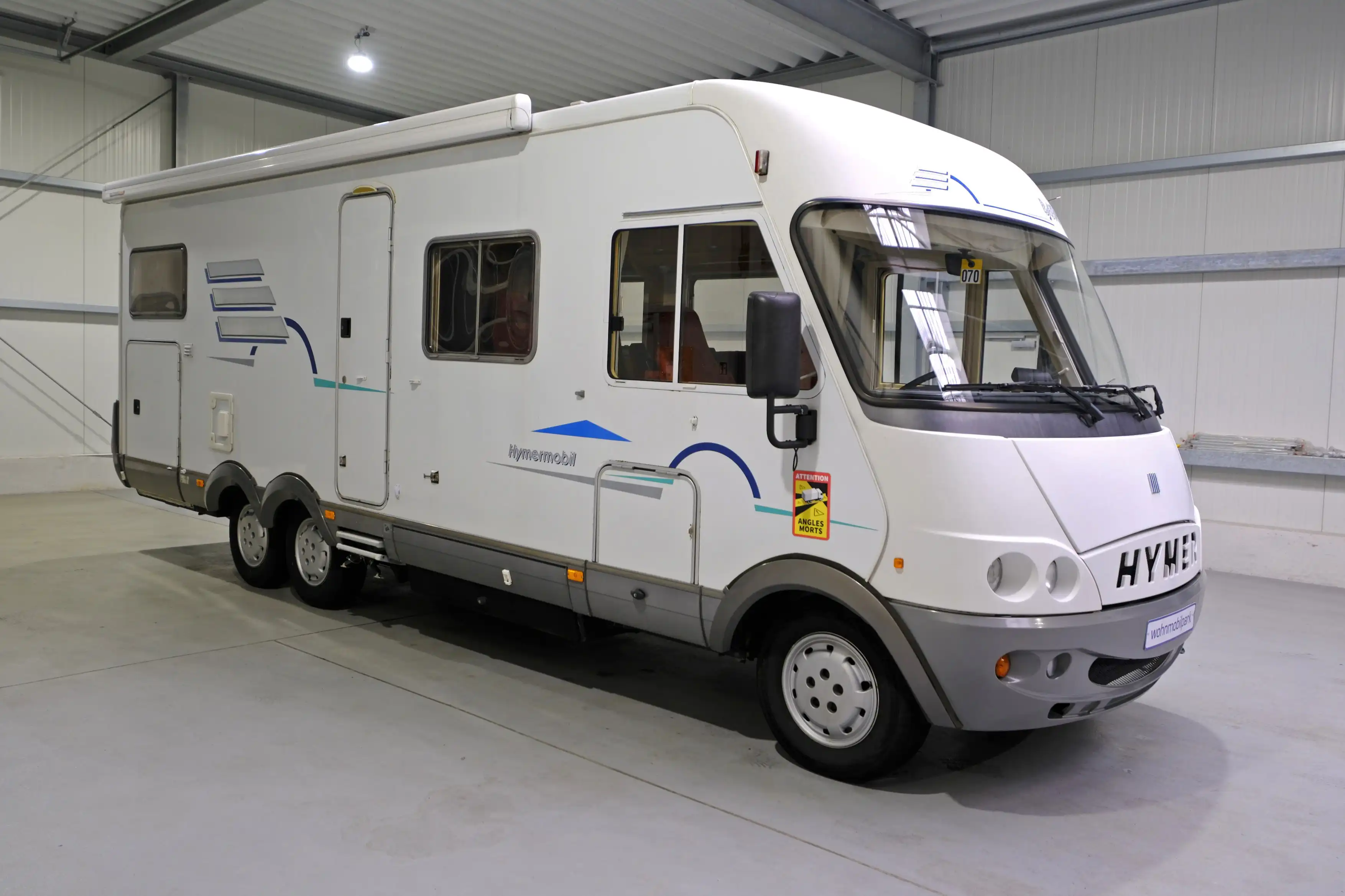 HYMER-ERIBA B 694 G/Festbett+Hubbett/Garage/Klimaanlage/Solaranlage/Markise/Bar-Version